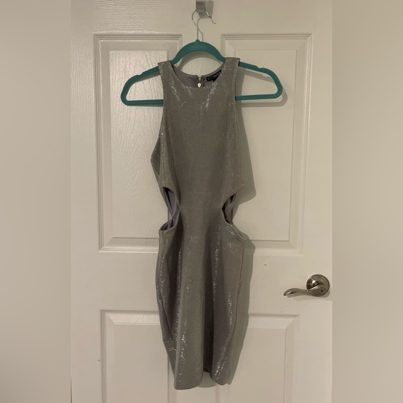 Express Dresses & Skirts - Sparkling silver mini dress with cutouts, new with tags